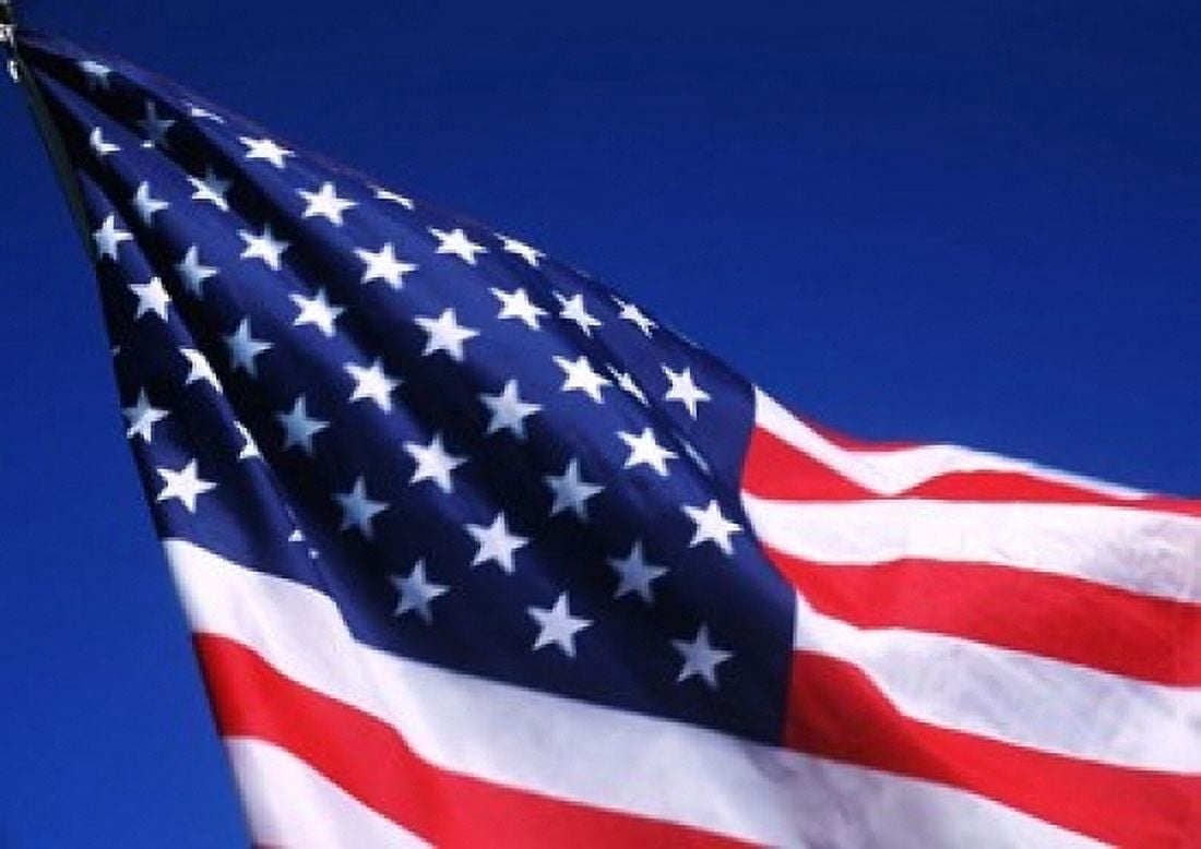 American Flag Waving in the Wind Canvas Art - Bill Bachmann DanitaDelimont (36 x 24)