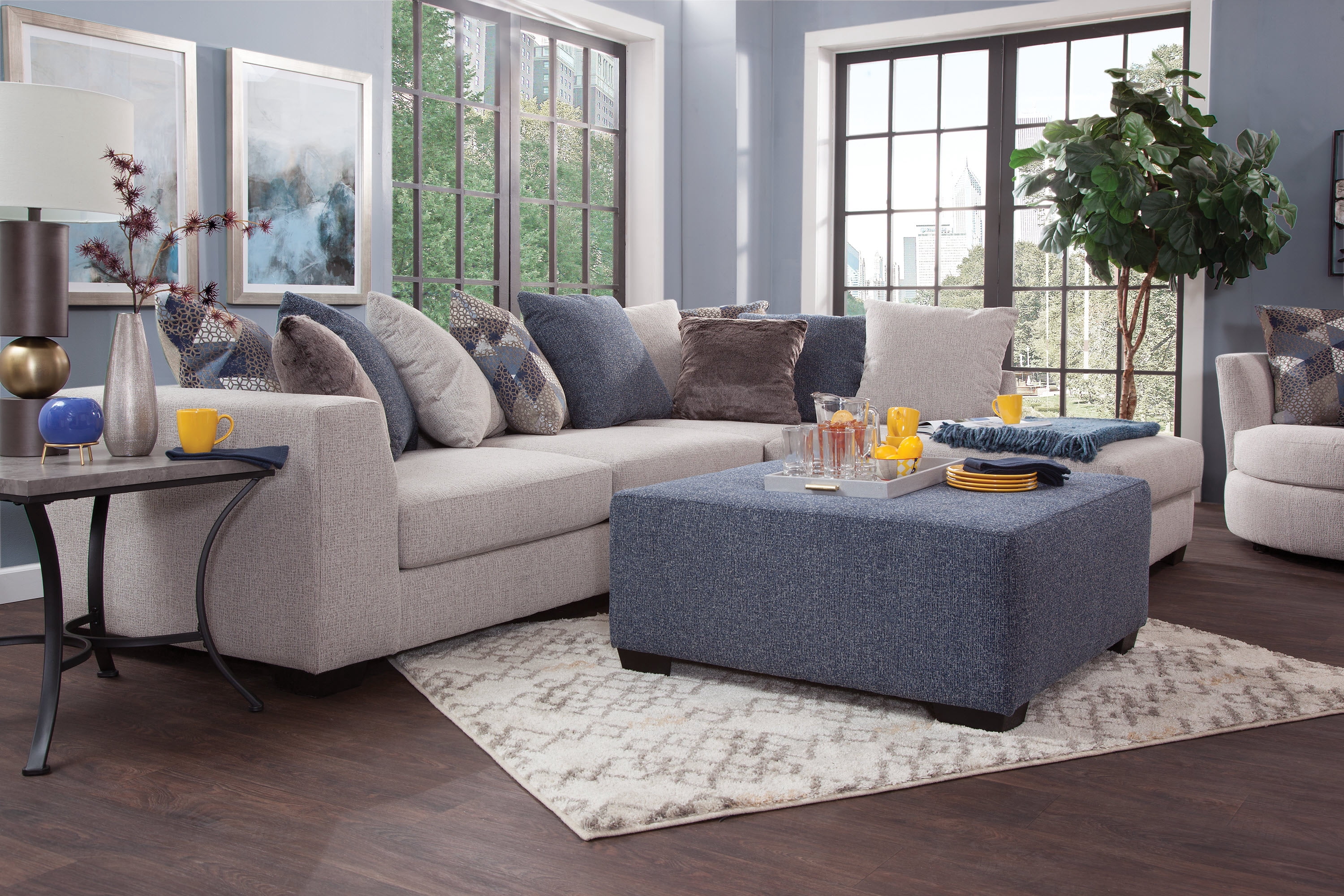 American Furniture L Shaped Sectional Sofa with 9 Loose Back Pillows and 2 Accent Pillows