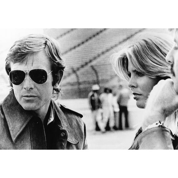 American Racing Driver Peter Revson With Model Marjorie Wallace At The Ontario Speedway. March 9 History