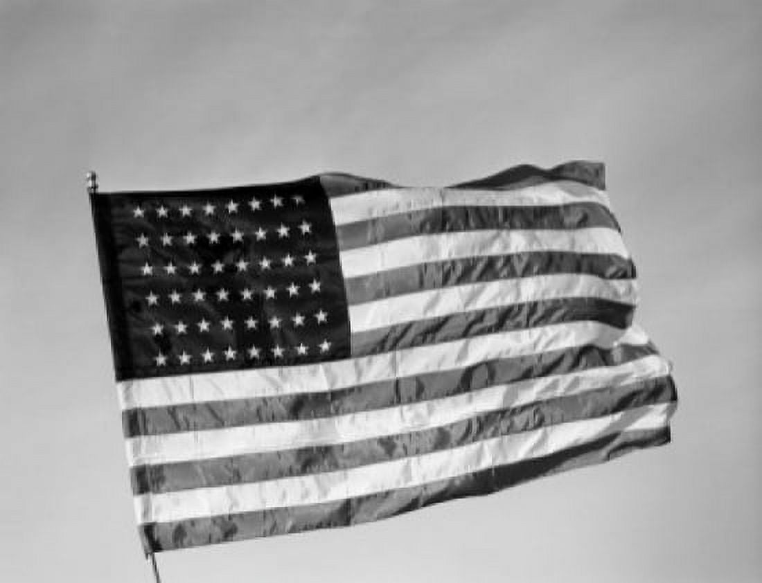American flag flying against sky Canvas Art - (24 x 36)