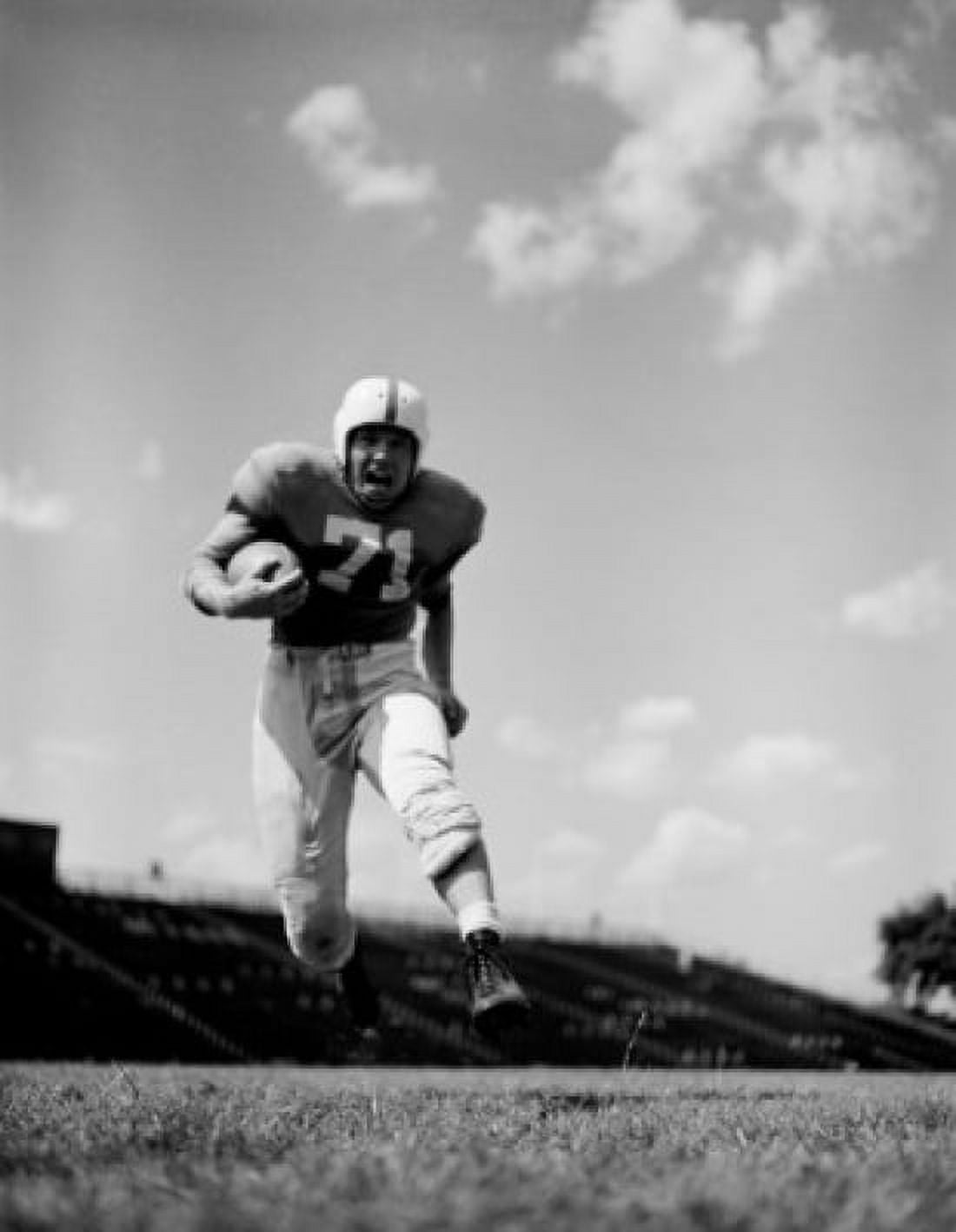American football player on field Canvas Art - (18 x 24)