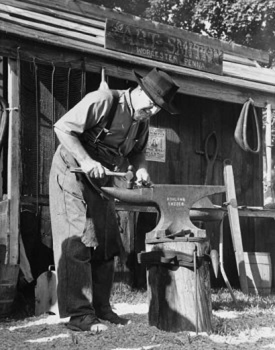 Amish blacksmith working on an anvil Worcester Pennsylvania USA Canvas Art - (18 x 24)