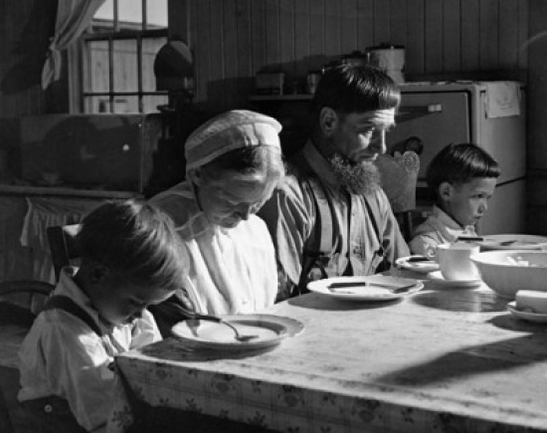 Amish family praying before a meal Canvas Art - (18 x 24)