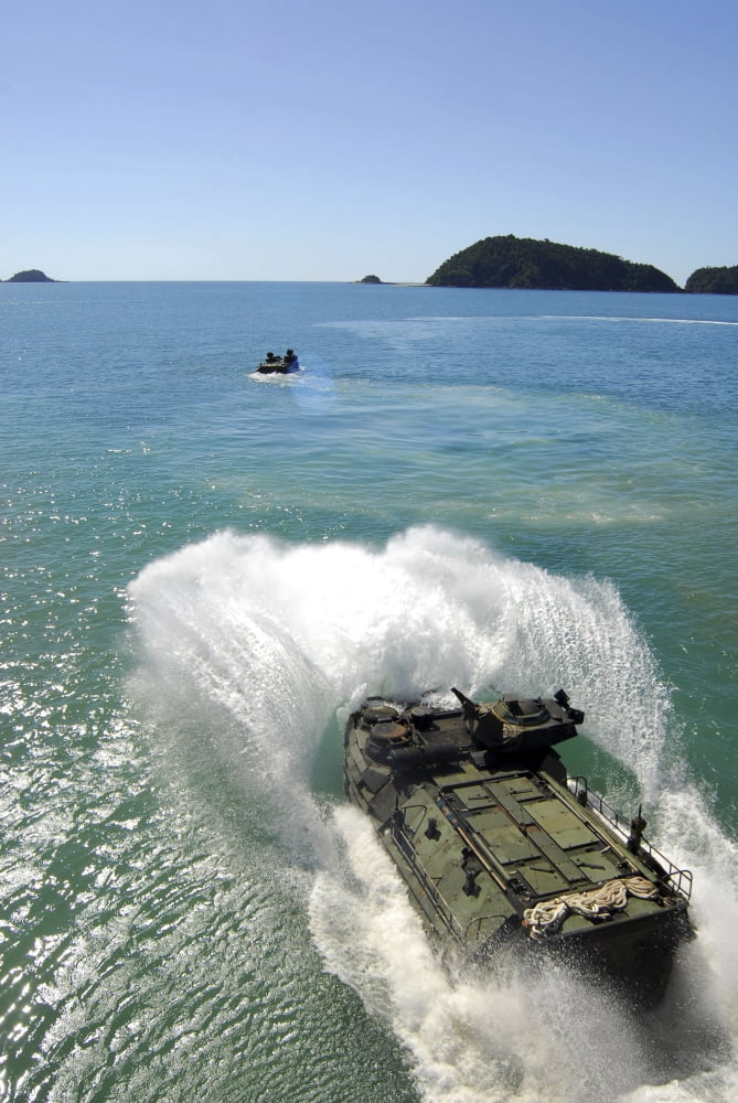 Amphibious Assault vehicles exit the well deck of amphibious transport dock ship USS Denver Canvas Art - Stocktrek Images (23 x 34)