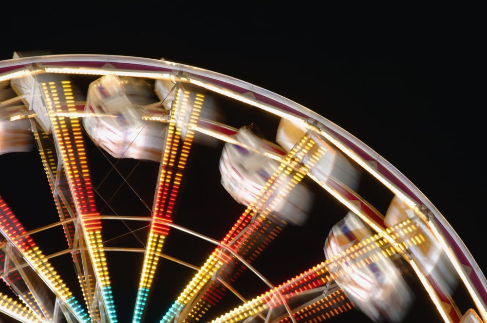 Amusement Park Ride Blurred Canvas Art - Dean Muz Design Pics (34 x 22)