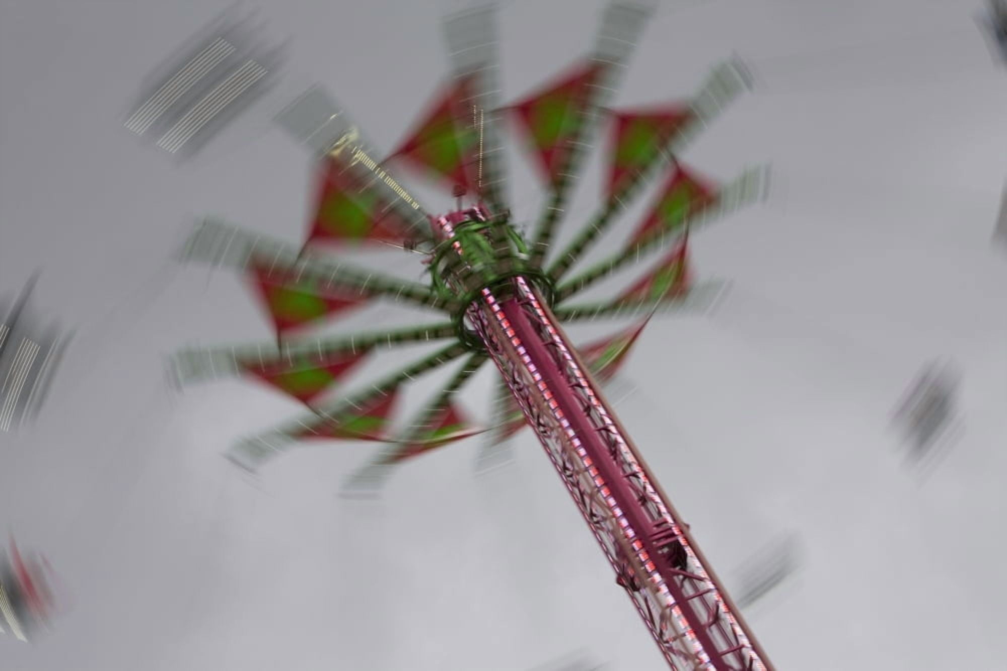 Amusement Ride In The Evening With Lights And Motion Portland Oregon United States of America Canvas Art - Michael Interisano Design Pics (38 x 24)