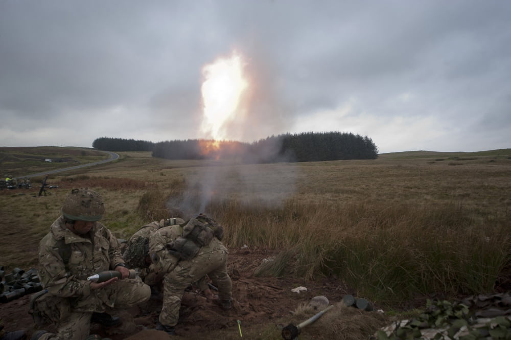 An 81mm mortar team live firing in support of a company attack Canvas Art - Andrew ChittockStocktrek Images (35 x 23)