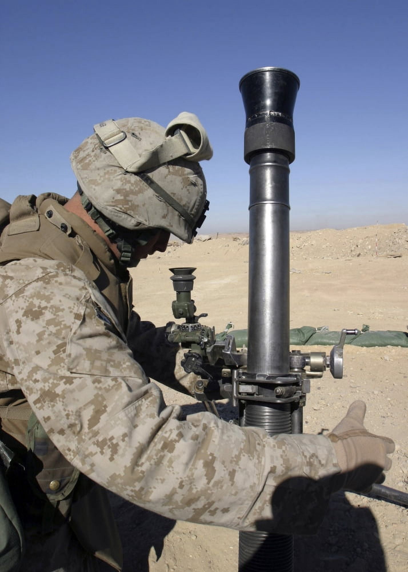 An 81mm mortarman adjusts the mortar sights during a fire mission Canvas Art - Stocktrek Images (24 x 33)