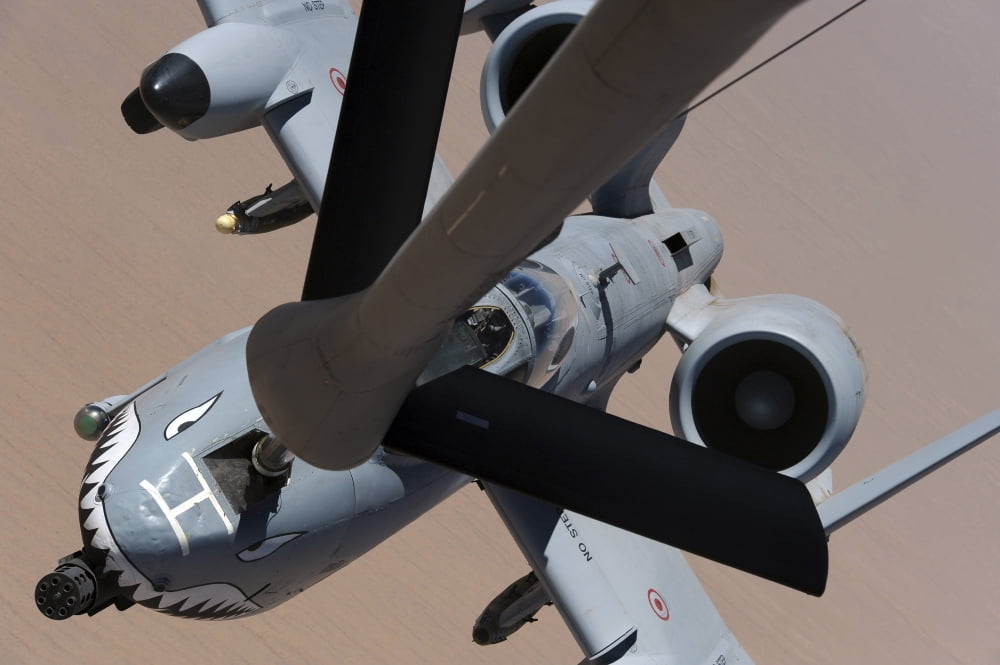 An A-10 Thunderbolt II receives fuel from a KC-135 Stratotanker Canvas Art - Stocktrek Images (35 x 23)