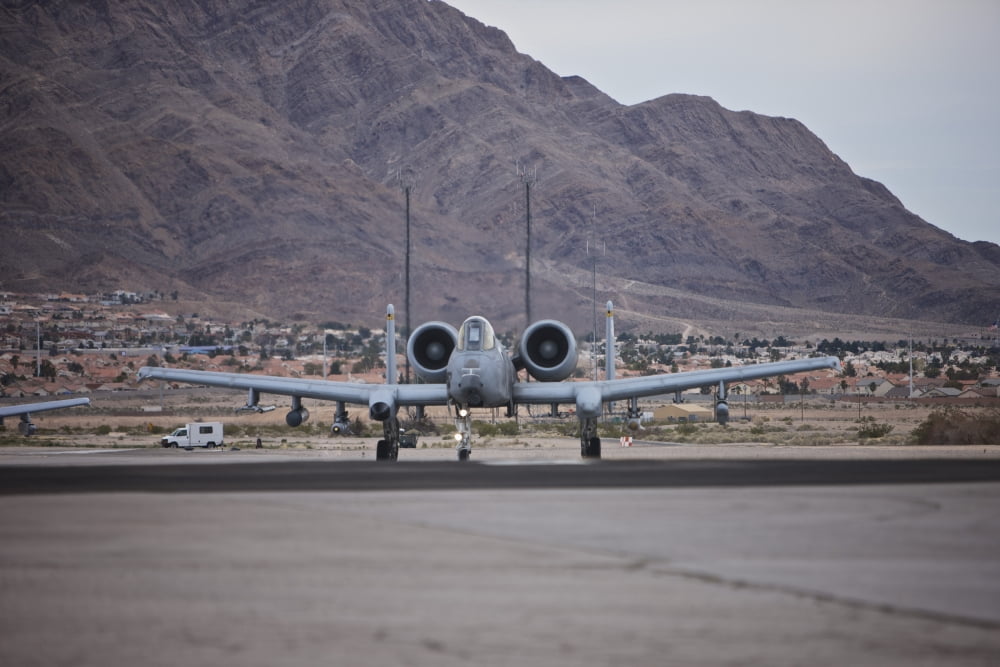 An A-10 Thunderbolt taxis to the runway at Nellis Air Force Base Nevada Canvas Art - Terry MooreStocktrek Images (35 x 23)