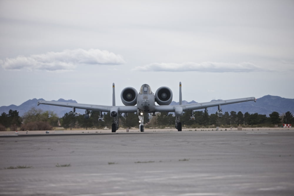 An A-10 Thunderbolt taxis to the runway at Nellis Air Force Base Nevada Canvas Art - Terry MooreStocktrek Images (35 x 23)