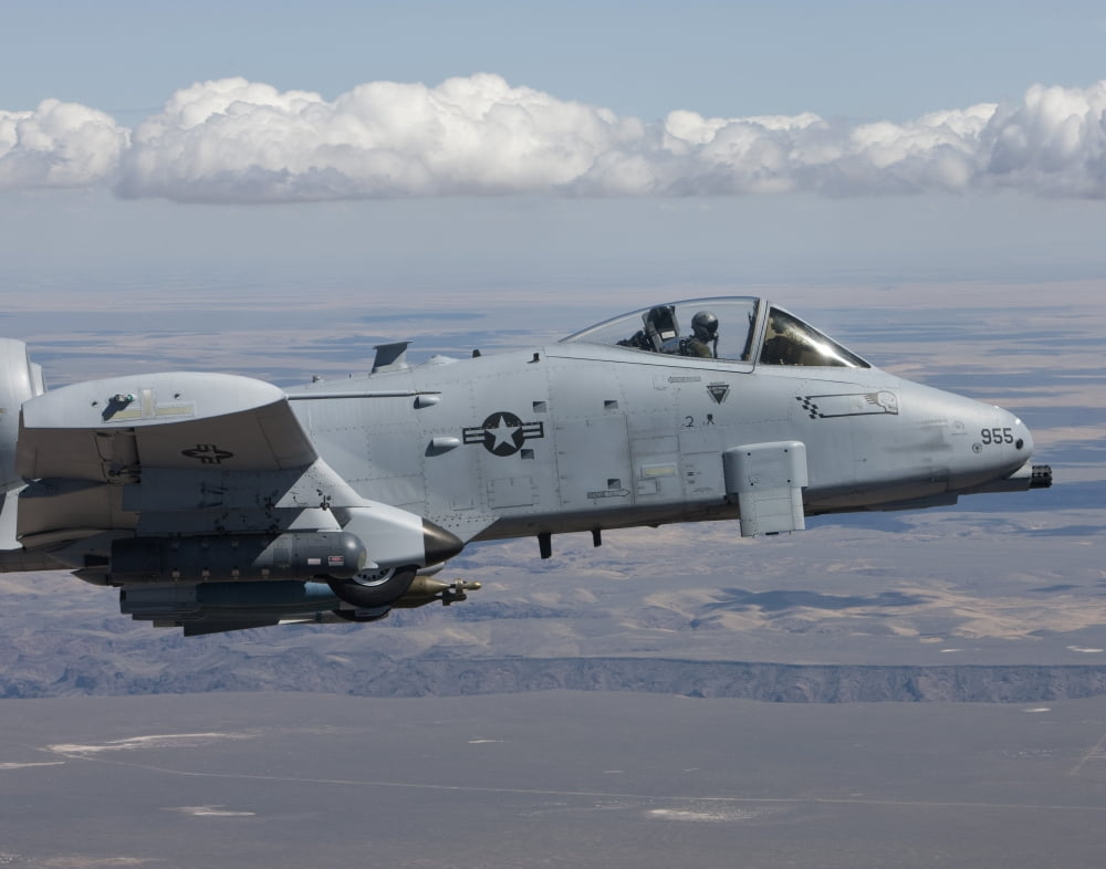 An A-10C Thunderbolt flies over the Saylor Creek bombing range Idaho Canvas Art - HIGH-G ProductionsStocktrek Images (16 x 13)