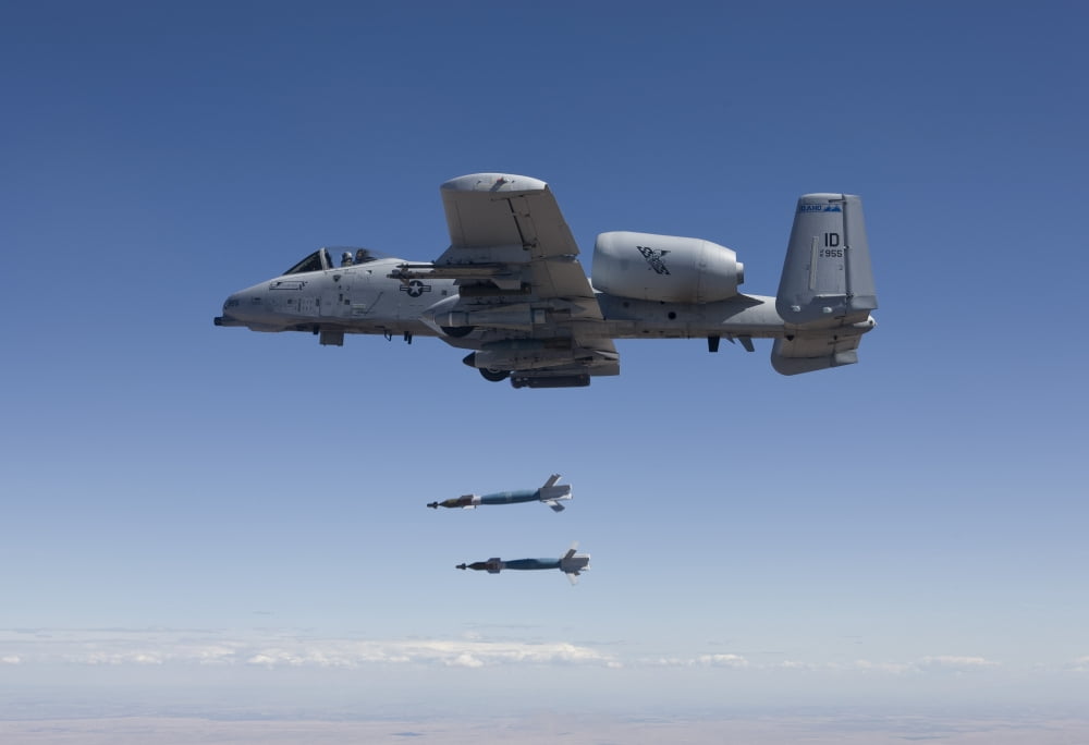 An A-10C Thunderbolt releases two GBU-12 laser guided bombs Canvas Art - HIGH-G ProductionsStocktrek Images (18 x 12)