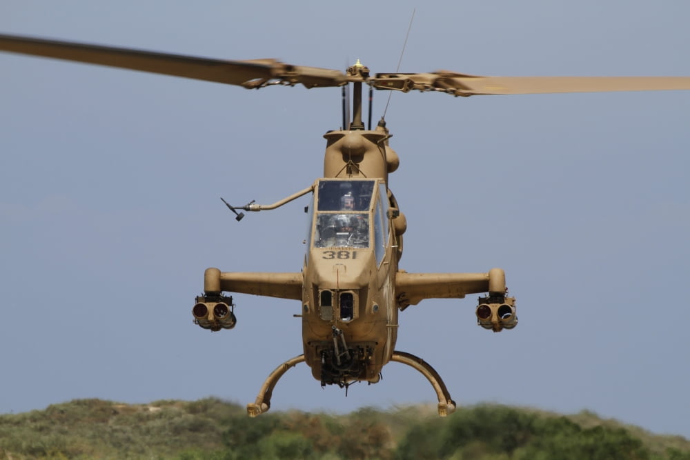 An AH-1S Tzefa attack helicopter of the Israeli Air Force Canvas Art - Ofer ZidonStocktrek Images (35 x 23)