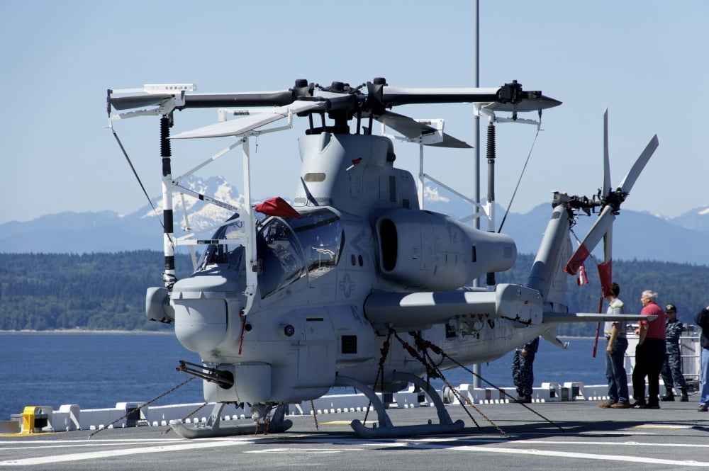 An AH-1W Cobra is chained to the flight deck of USS Bonhomme Richard Canvas Art - Stocktrek Images (35 x 23)