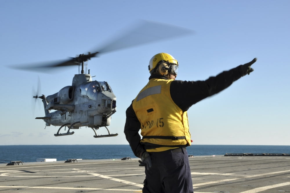 An AH-1W Super Cobra helicopter lifts off from USS Ponce Canvas Art - Stocktrek Images (35 x 23)