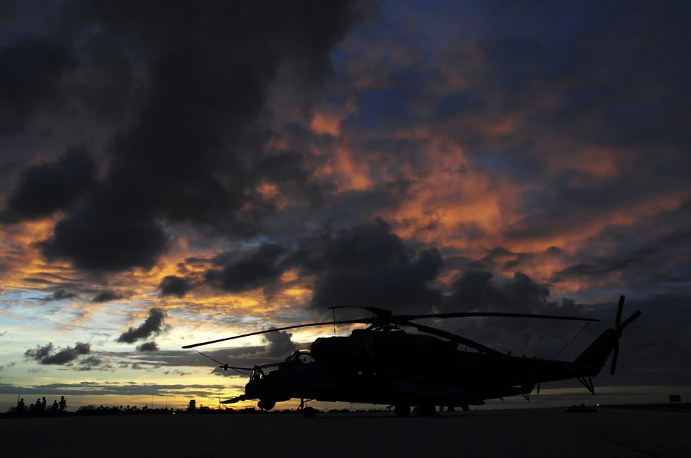 An AH-2 Sabre at sunset in Natal Brazil Canvas Art - Daniele FaccioliStocktrek Images (17 x 12)