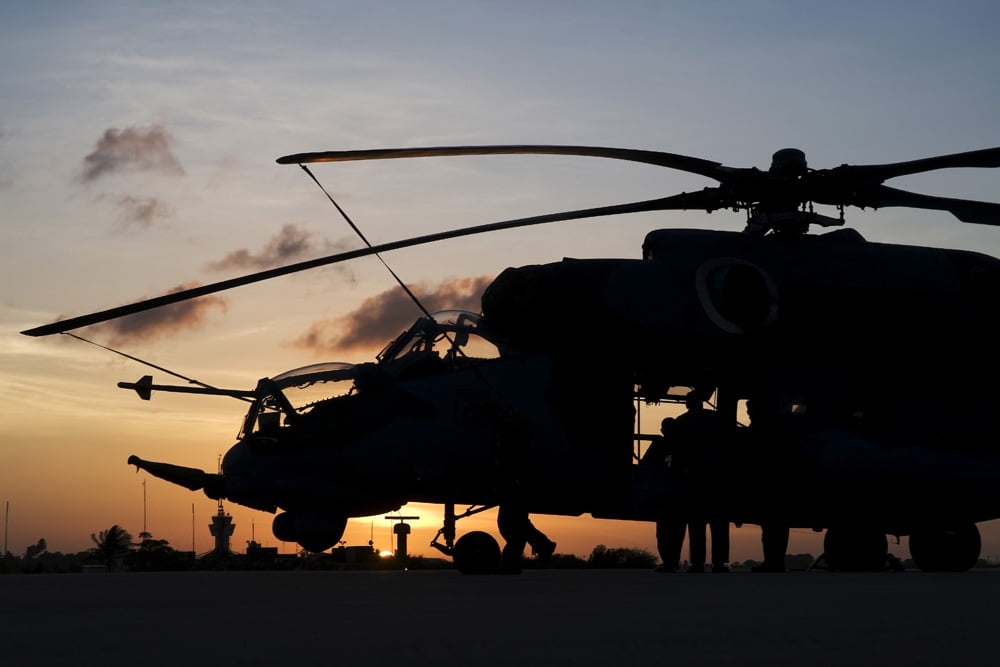 An AH-2 Sabre at sunset in Natal Brazil Canvas Art - Daniele FaccioliStocktrek Images (17 x 12)