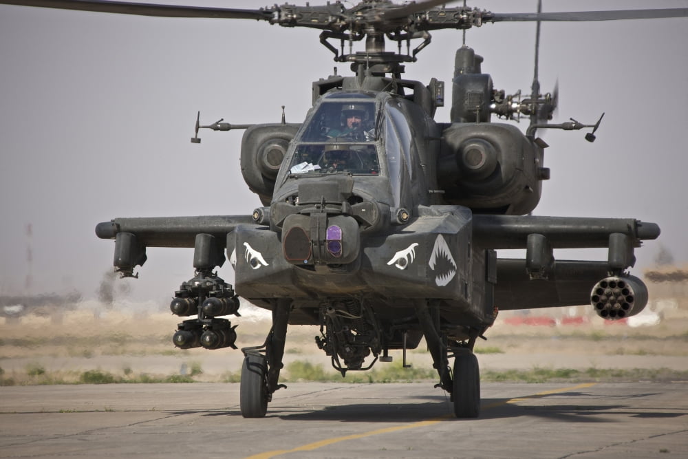 An AH-64 Apache helicopter returns from a mission over Iraq Canvas Art - Terry MooreStocktrek Images (18 x 12)