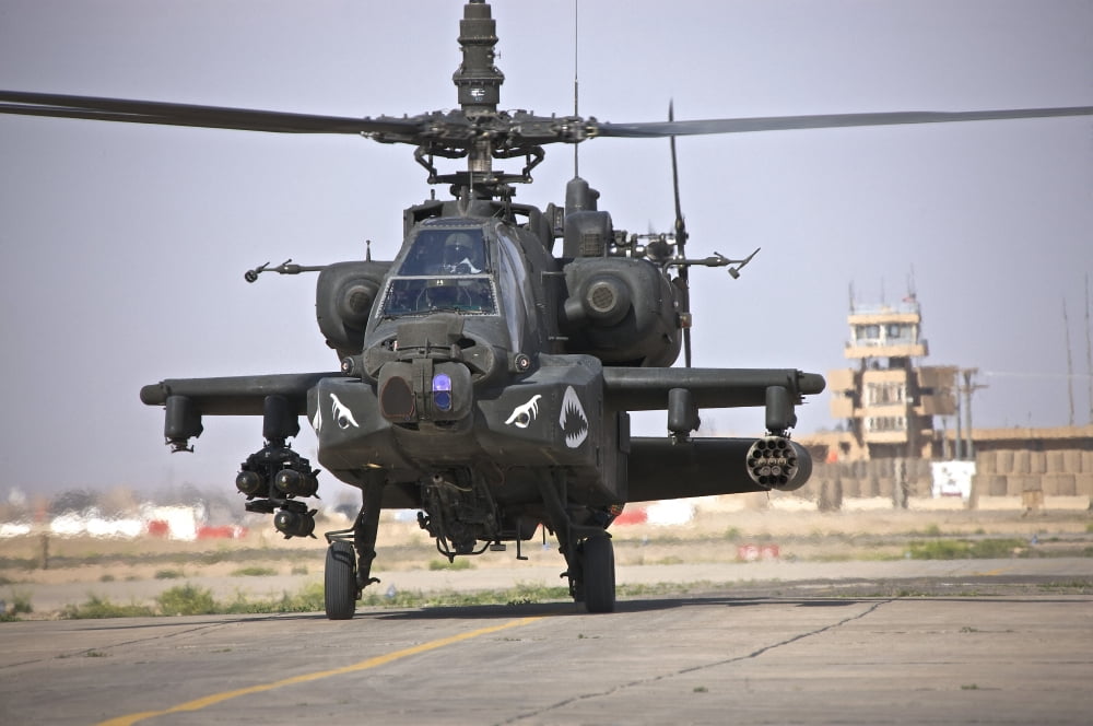 An AH-64 Apache helicopter returns from a mission over Iraq Canvas Art - Terry MooreStocktrek Images (35 x 23)