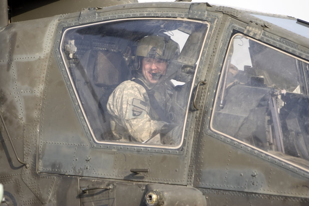 An AH-64 Apache prepares to leave its pad for a mission Canvas Art - Terry MooreStocktrek Images (18 x 12)
