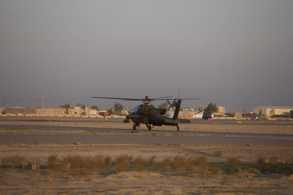 An AH-64D Apache Longbow Block III attack helicopter waits for clearance Canvas Art - Terry MooreStocktrek Images (35 x 23)