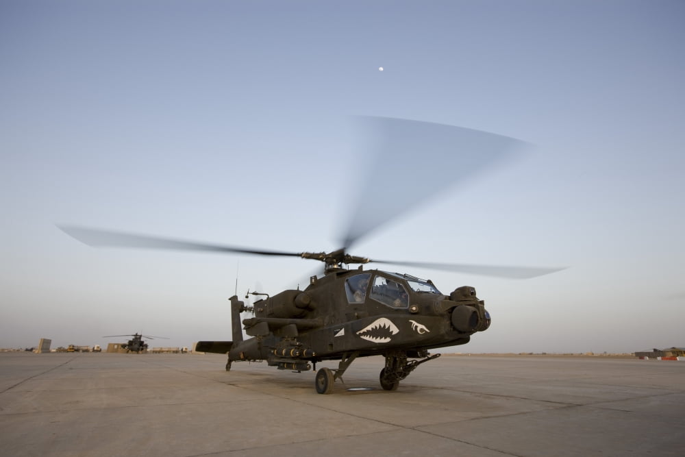 An AH-64D Apache Longbow Block III gets ready for takeoff Canvas Art - Terry MooreStocktrek Images (18 x 12)
