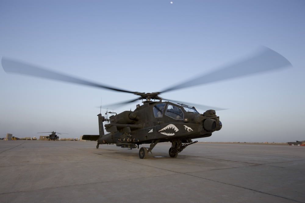 An AH-64D Apache Longbow Block III gets ready for takeoff Canvas Art - Terry MooreStocktrek Images (35 x 23)