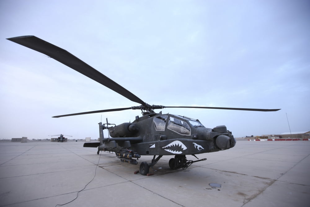 An AH-64D Apache Longbow Block III prepares for takeoff Canvas Art - Terry MooreStocktrek Images (18 x 12)