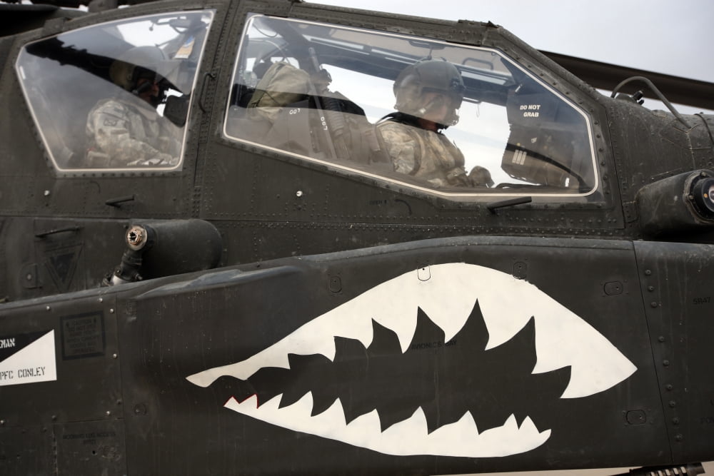 An AH-64D Apache Longbow Block III prepares for takeoff Canvas Art - Terry MooreStocktrek Images (35 x 23)