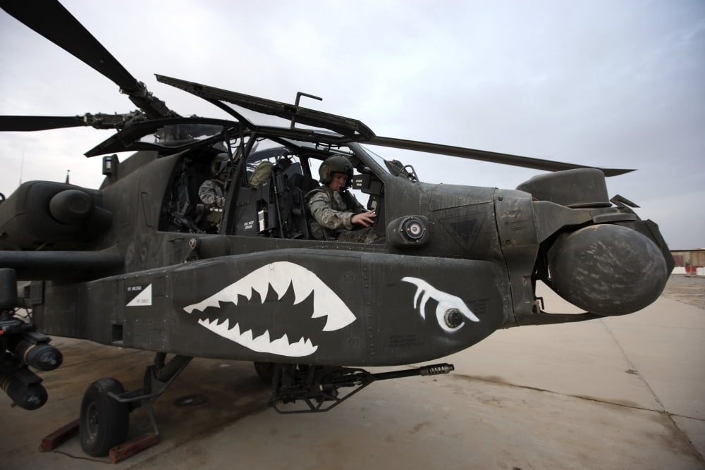 An AH-64D Apache Longbow Block III prepares for takeoff Canvas Art - Terry MooreStocktrek Images (35 x 23)