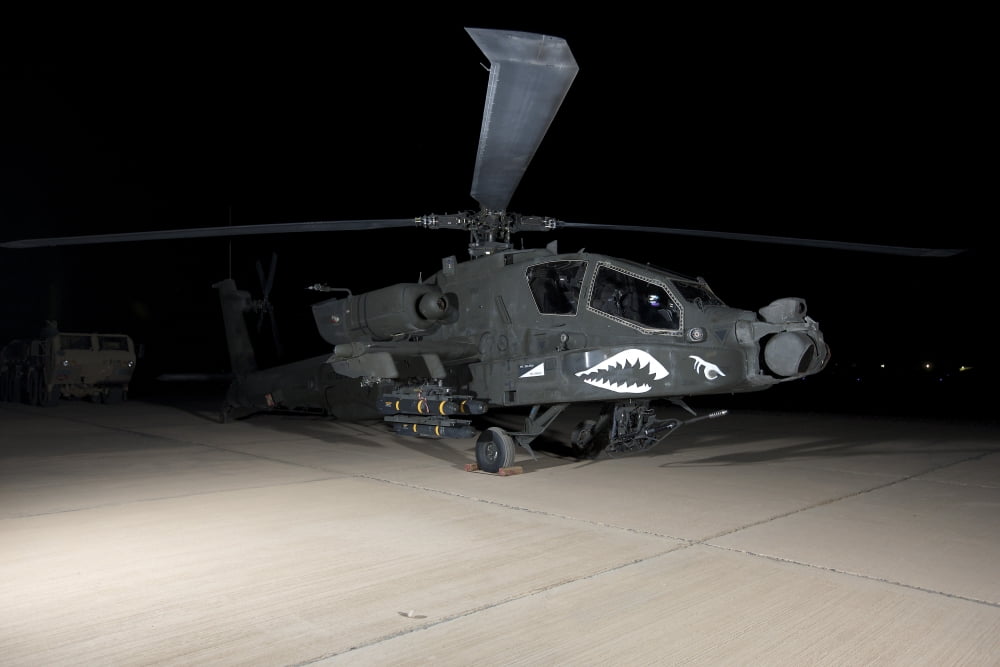 An AH-64D Apache Longbow at night Tikrit Iraq Canvas Art - Terry MooreStocktrek Images (18 x 12)