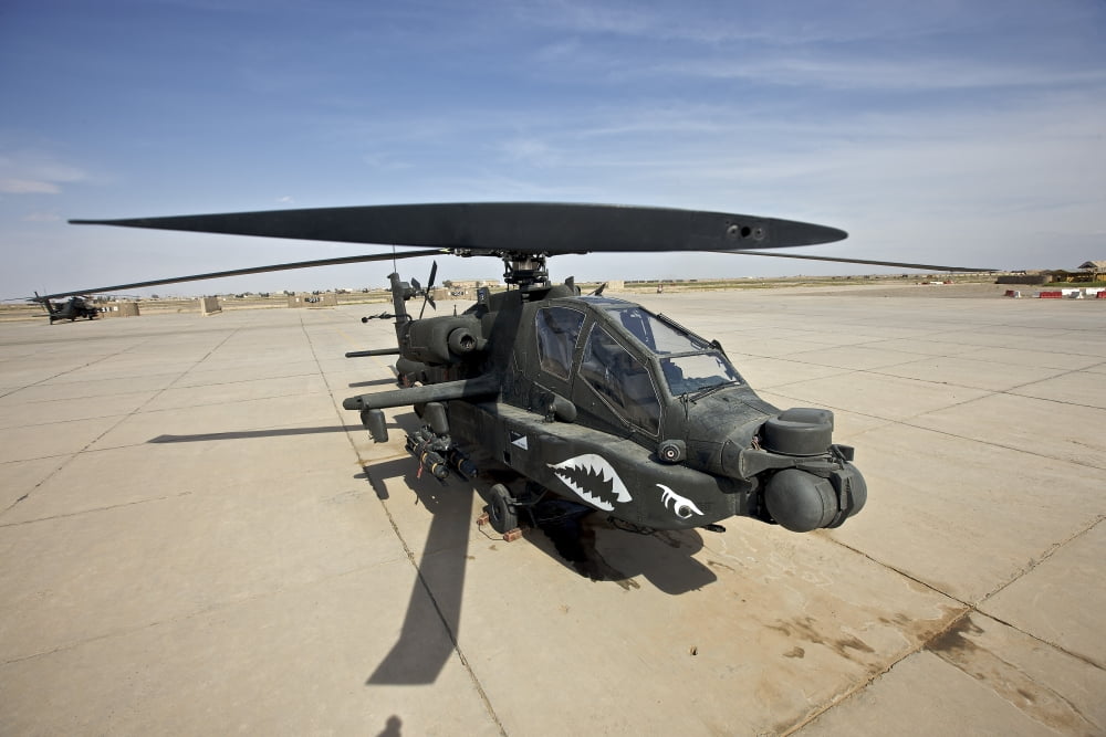 An AH-64D Apache helicopter at COB Speicher Tikrit Iraq Canvas Art - Terry MooreStocktrek Images (18 x 12)