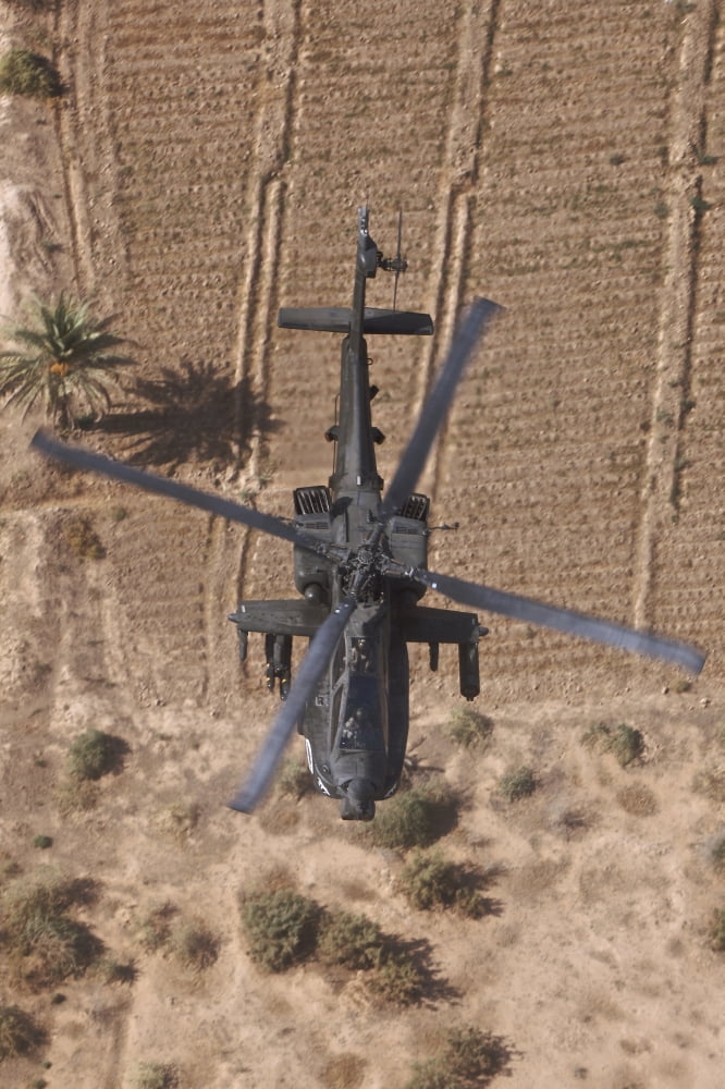 An AH-64D Apache helicopter in flight over Northern Iraq Canvas Art - Terry MooreStocktrek Images (12 x 18)