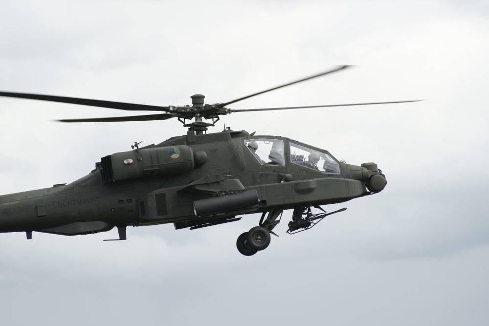 An AH-64D Apache helicopter of the Royal Netherlands Air Force Canvas Art - Ramon Van OpdorpStocktrek Images (18 x 12)