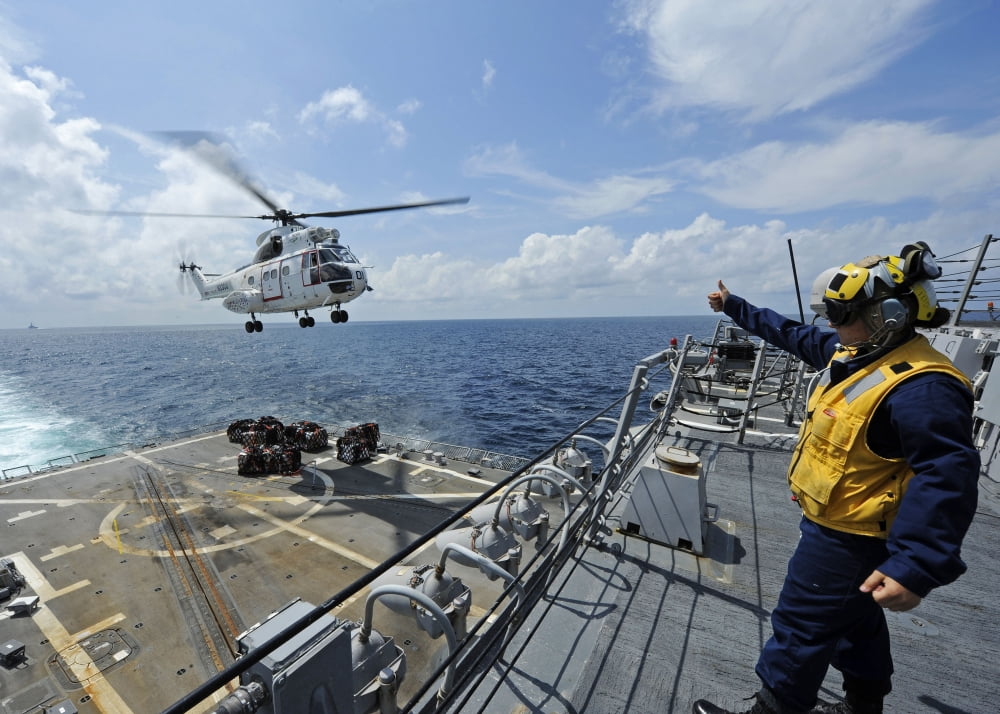 An AS-332 Super Puma helicopter during a vertical replenishment Canvas Art - Stocktrek Images (33 x 24)