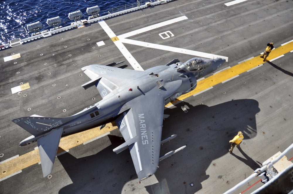 An AV-8B Harrier prepares to takeoff from USS Peleliu Canvas Art - Stocktrek Images (35 x 23)