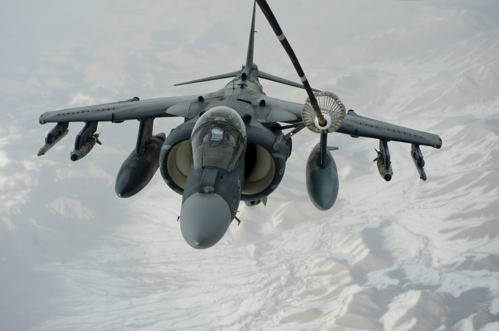 An AV-8B Harrier receives fuel over Afghanistan from a KC-10 Extender Canvas Art - Stocktrek Images (35 x 23)