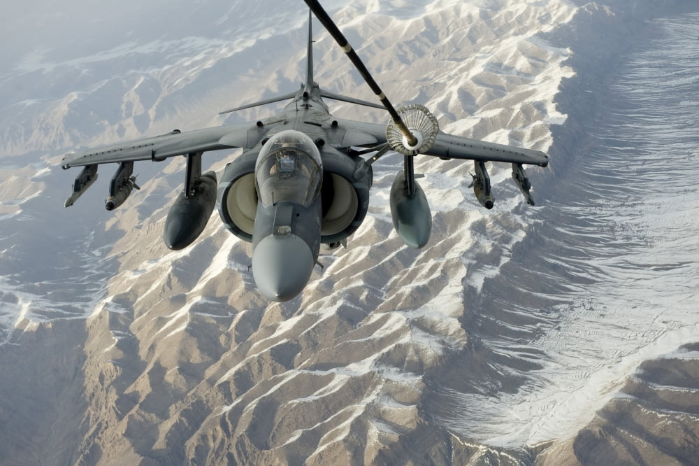 An AV-8B Harrier receives fuel over Afghanistan from a KC-10 Extender Canvas Art - Stocktrek Images (35 x 24)