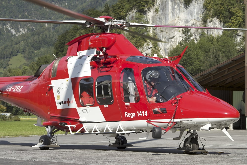 An AW109 helicopter of the Swiss Air Rescue (REGA) Canvas Art - Luca NicolottiStocktrek Images (34 x 23)