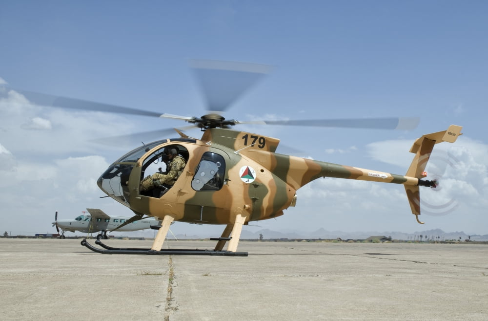 An Afghan Air Force MD-530F helicopter at Shindand Air Base Canvas Art - Giovanni CollaStocktrek Images (35 x 23)