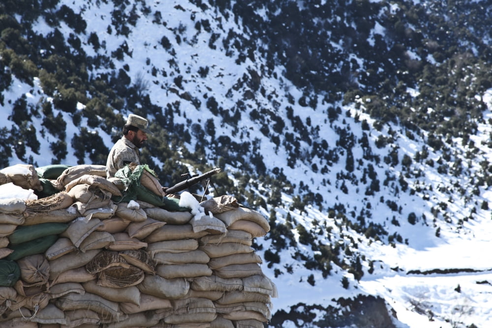 An Afghan Border Patrolman provides security from a defensive position Canvas Art - Stocktrek Images (35 x 23)