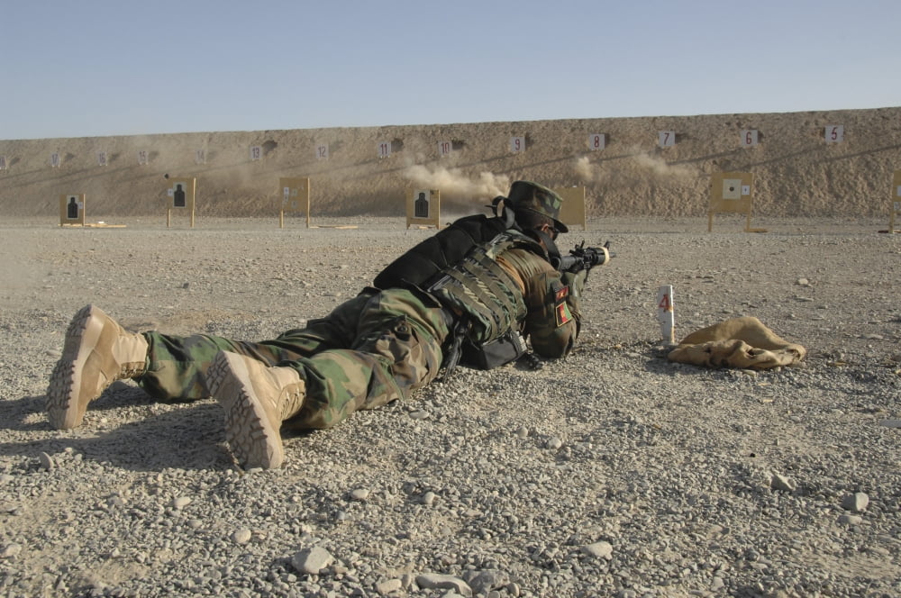 An Afghan Commando engages training targets on the firing range Canvas Art - Stocktrek Images (34 x 23)