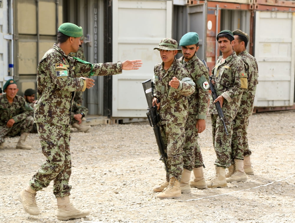 An Afghan National Army instructor instructs junior Afghan soldiers Canvas Art - Stocktrek Images (32 x 25)
