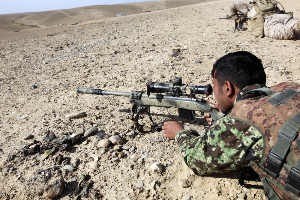 An Afghan National Army soldier fires an M40A5 rifle Canvas Art - Stocktrek Images (34 x 23)