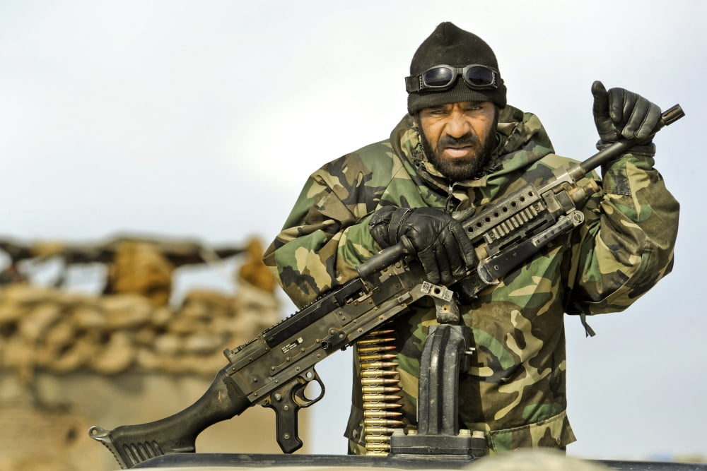 An Afghan National Army soldier provides security at a checkpoint in Afghanistan Canvas Art - Stocktrek Images (35 x 23)