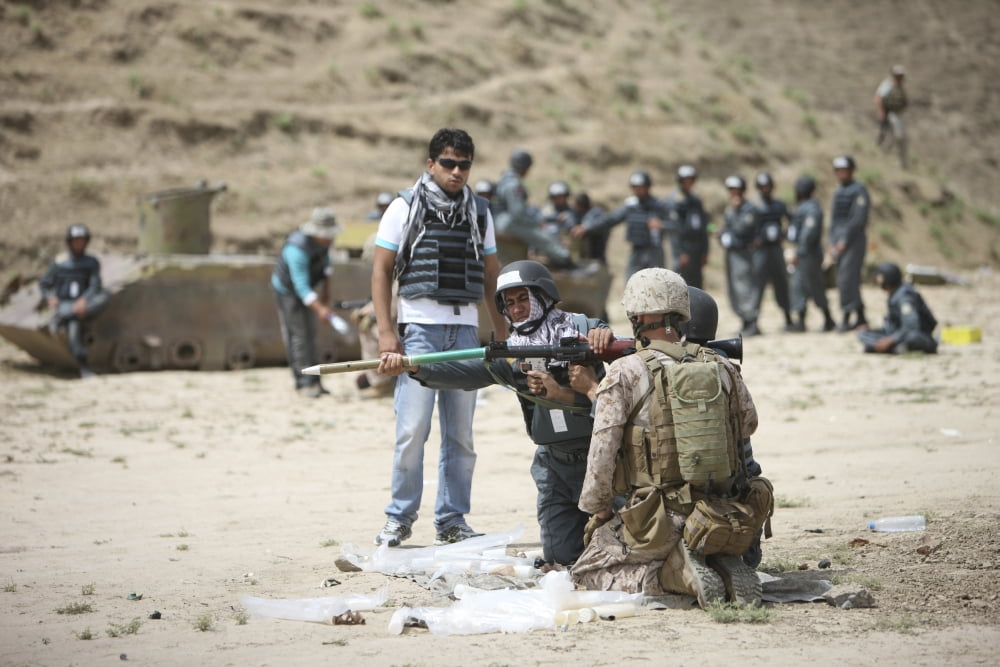 An Afghan Police student loads a RPG-7 grenade launcher Canvas Art - Terry MooreStocktrek Images (35 x 24)