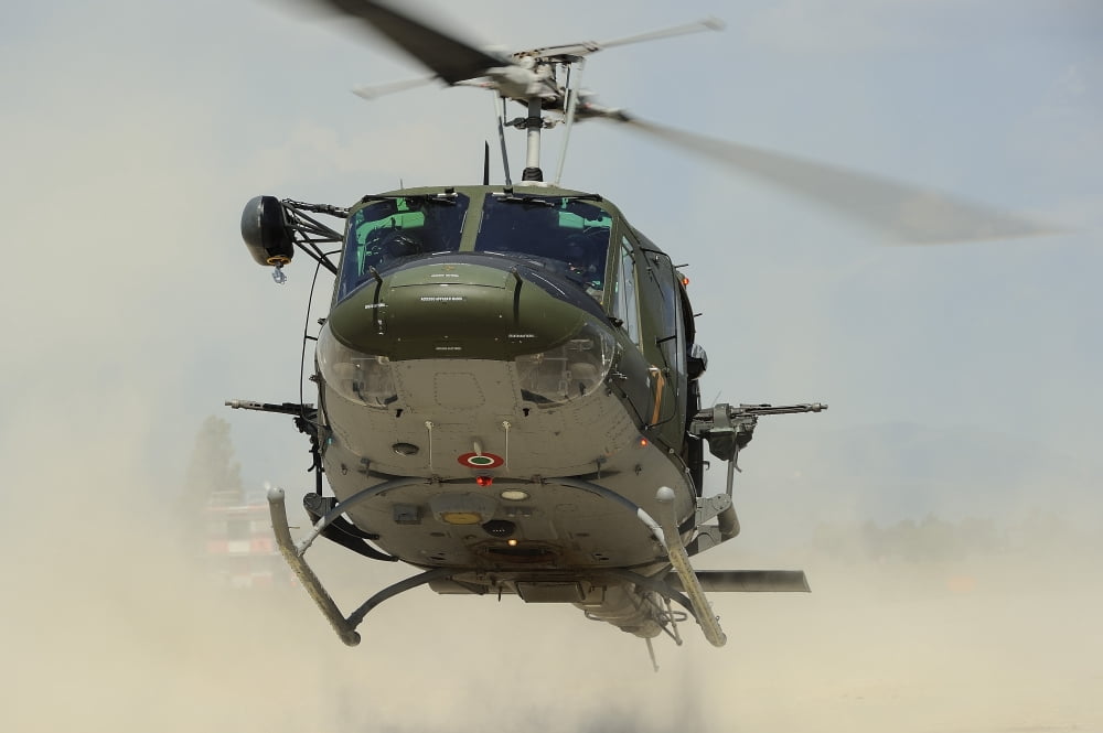An Agusta Bell AB 212 of the Italian Air Force landing Canvas Art - Remo GuidiStocktrek Images (18 x 12)