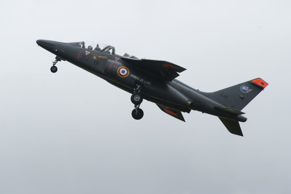 An Alpha Jet of the French Air Force in flight over the Netherlands Canvas Art - Ramon Van OpdorpStocktrek Images (18 x 12)