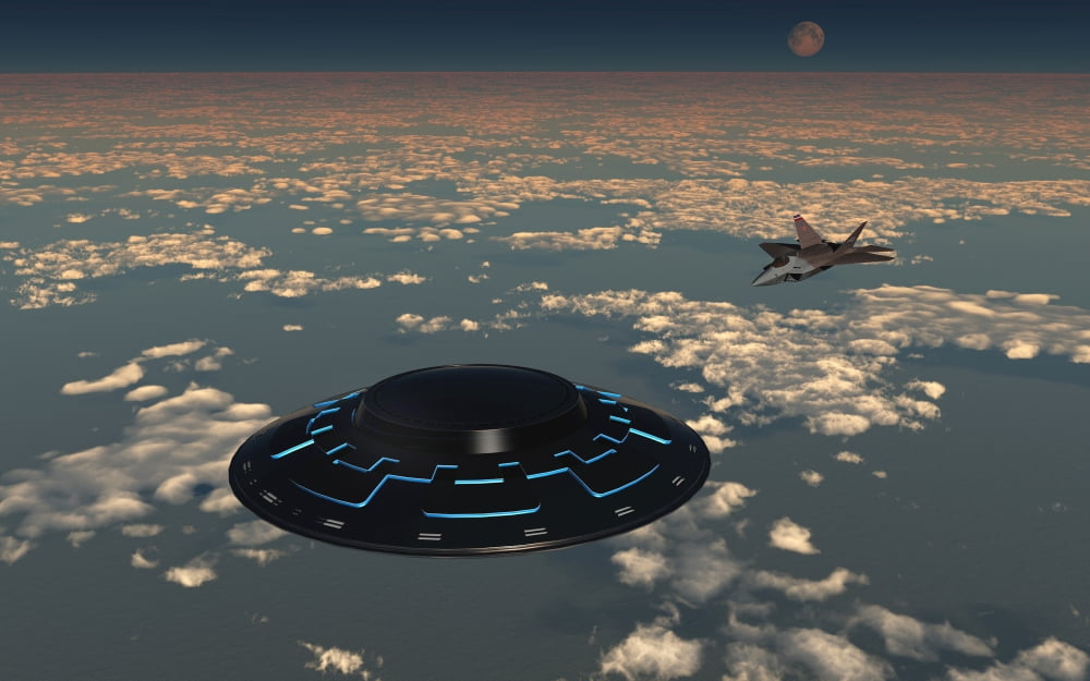 An American F-22 Raptor chasing a larger UFO in American airspace Canvas Art - Mark StevensonStocktrek Images (36 x 23)
